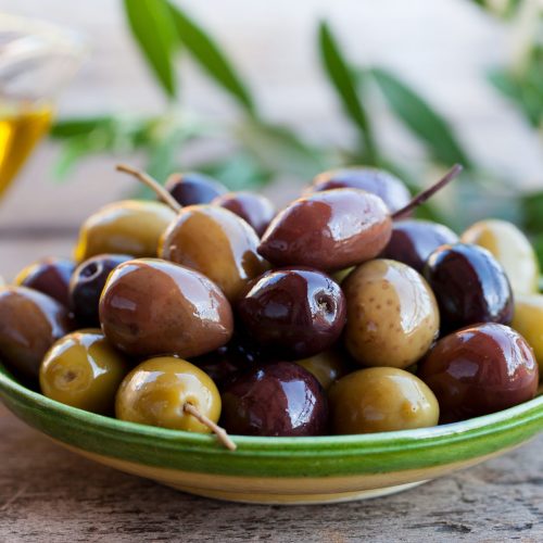 assortment of fresh olives on a plate with olive t QPZJ3XH