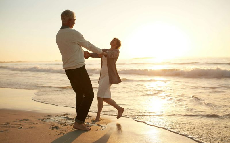 Romantic senior couple enjoying a day at the beach